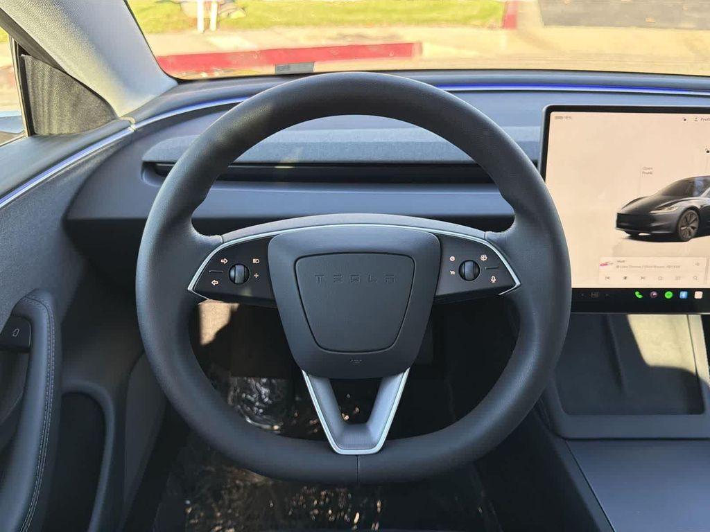 used 2025 Tesla Model 3 car, priced at $36,442