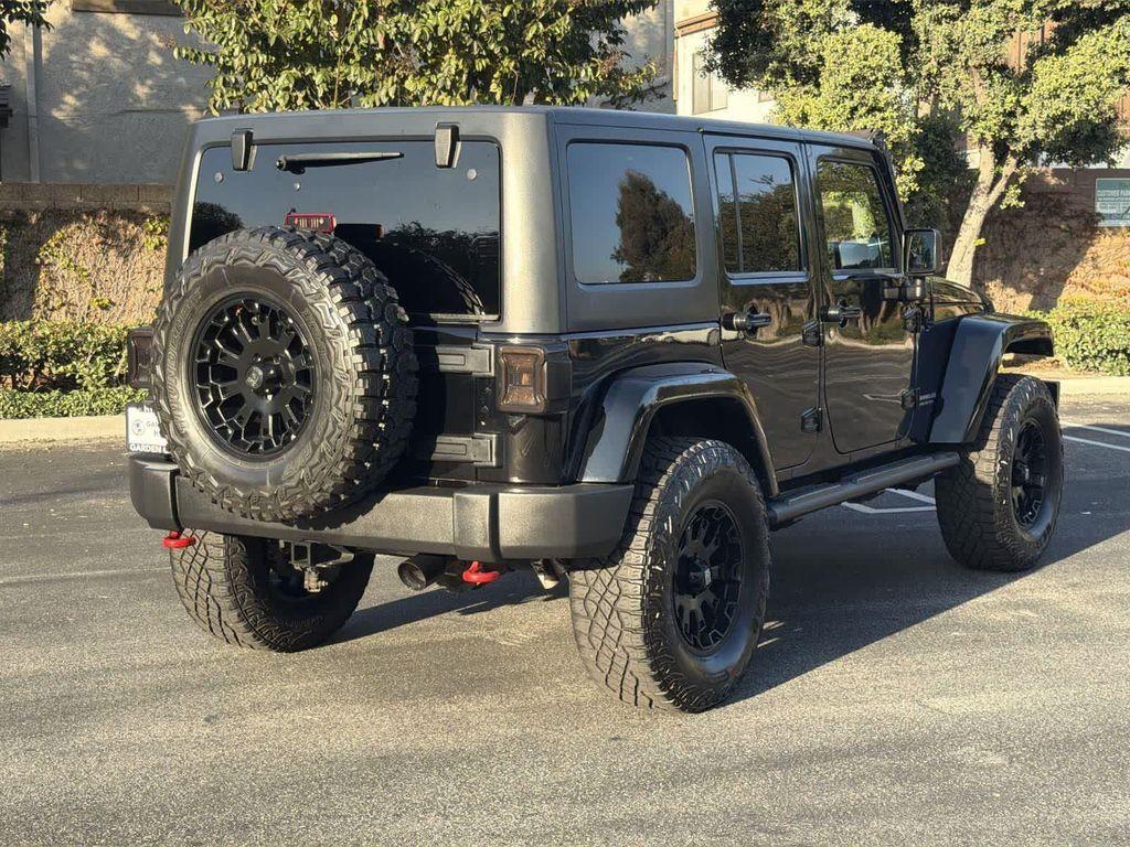 used 2014 Jeep Wrangler Unlimited car, priced at $18,928