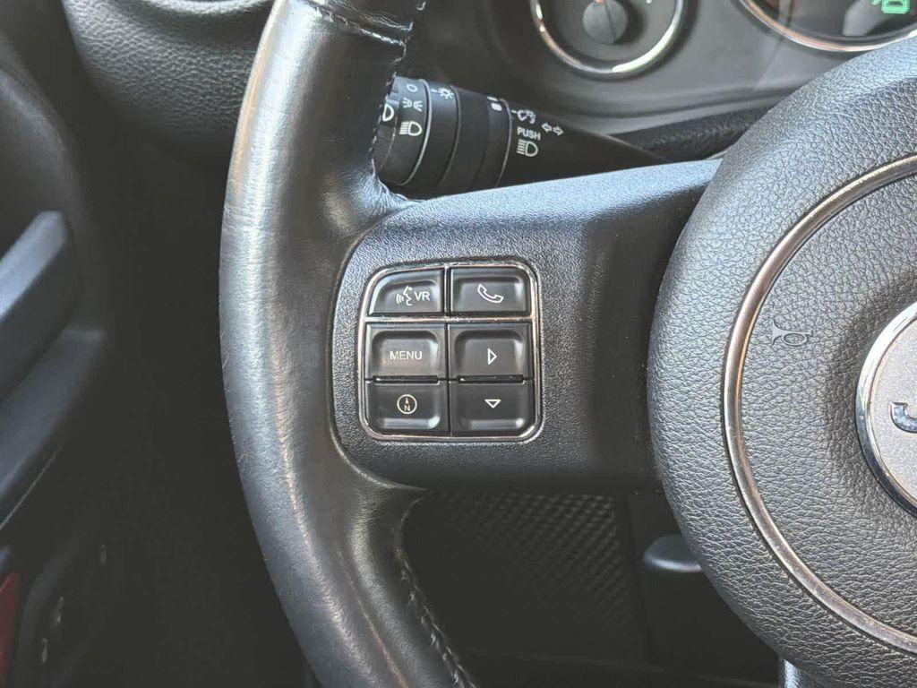 used 2014 Jeep Wrangler Unlimited car, priced at $18,928