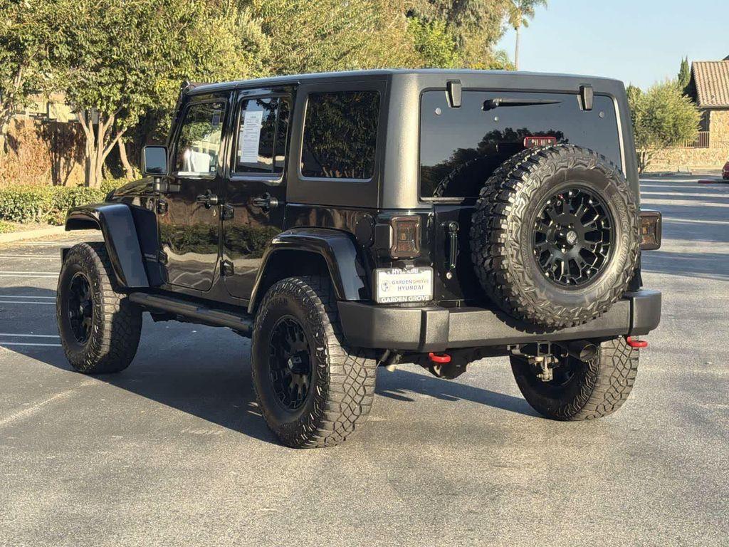 used 2014 Jeep Wrangler Unlimited car, priced at $18,928