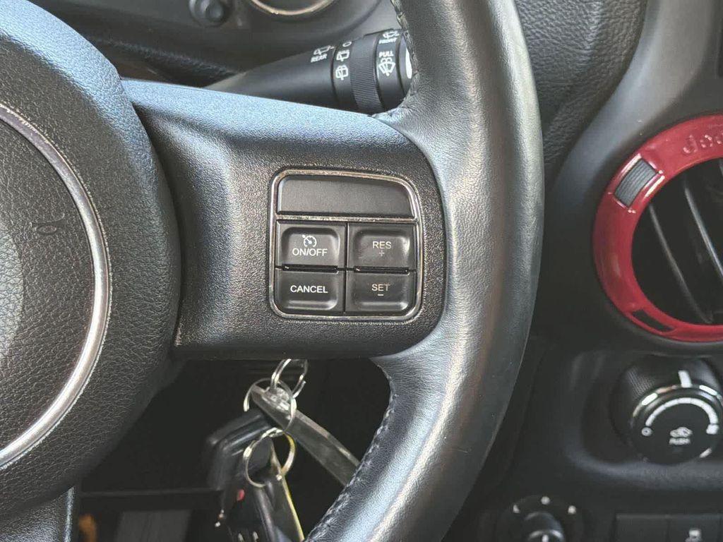 used 2014 Jeep Wrangler Unlimited car, priced at $18,928