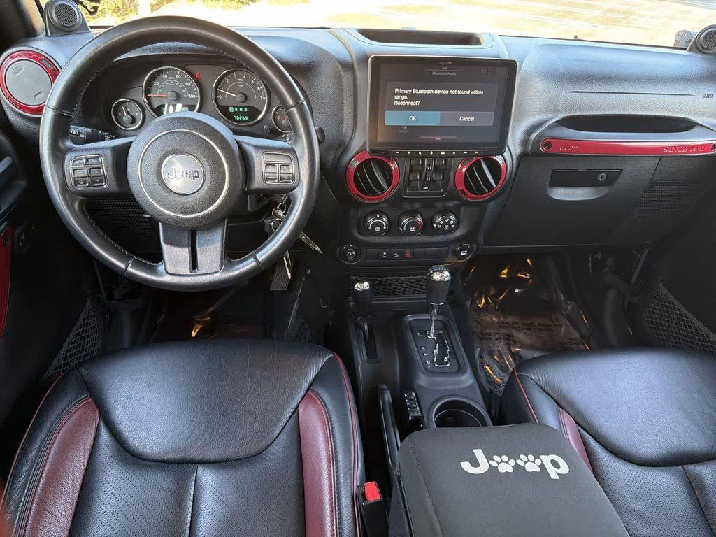 used 2014 Jeep Wrangler Unlimited car, priced at $18,928