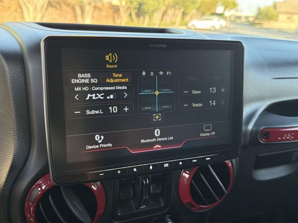 used 2014 Jeep Wrangler Unlimited car, priced at $18,928