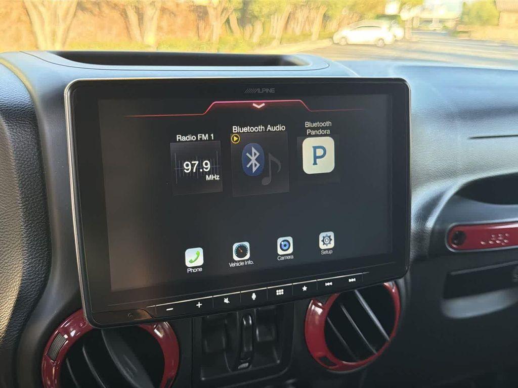 used 2014 Jeep Wrangler Unlimited car, priced at $18,928