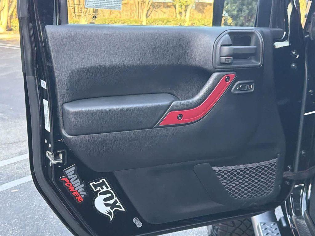 used 2014 Jeep Wrangler Unlimited car, priced at $18,928