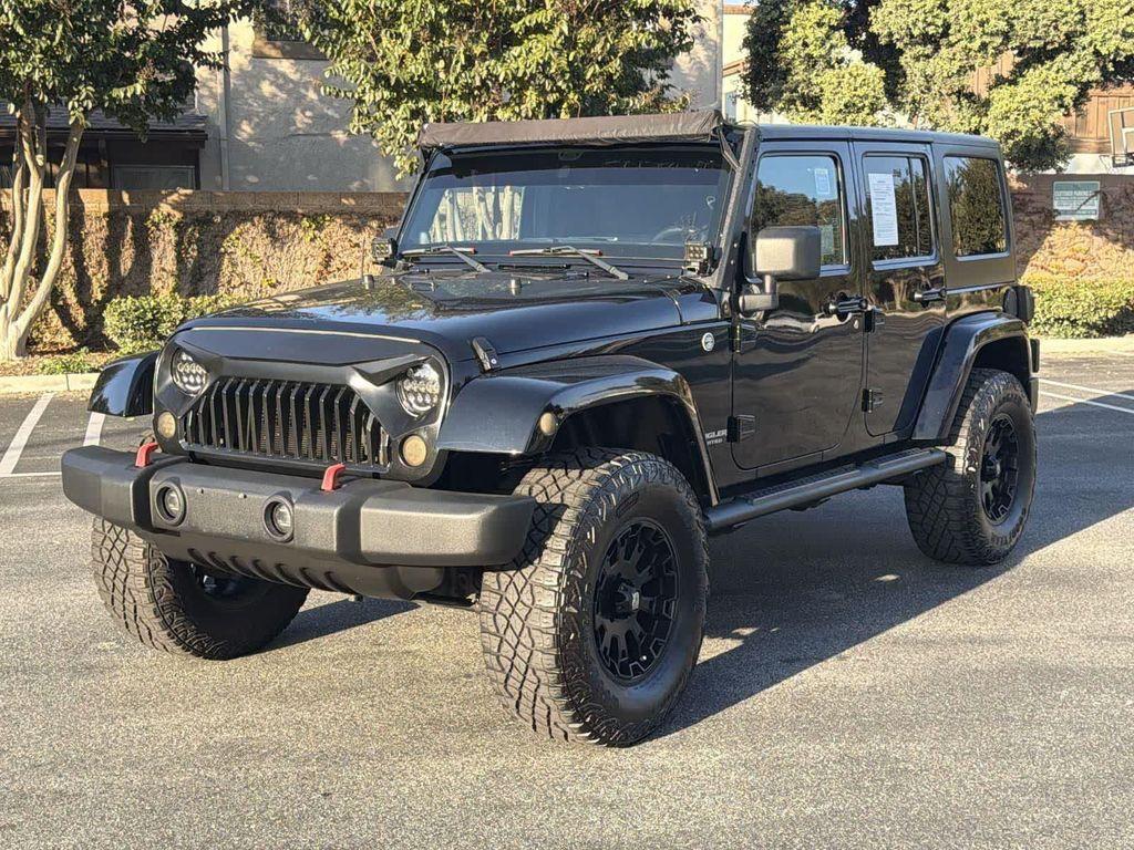 used 2014 Jeep Wrangler Unlimited car, priced at $18,928