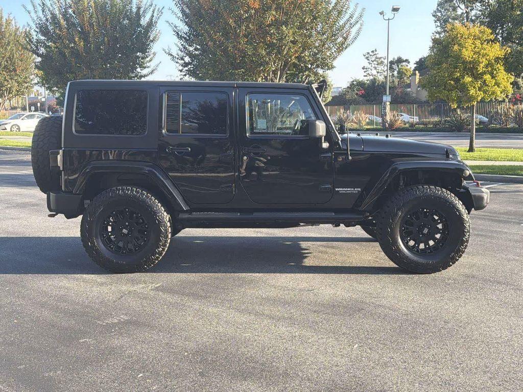 used 2014 Jeep Wrangler Unlimited car, priced at $18,928