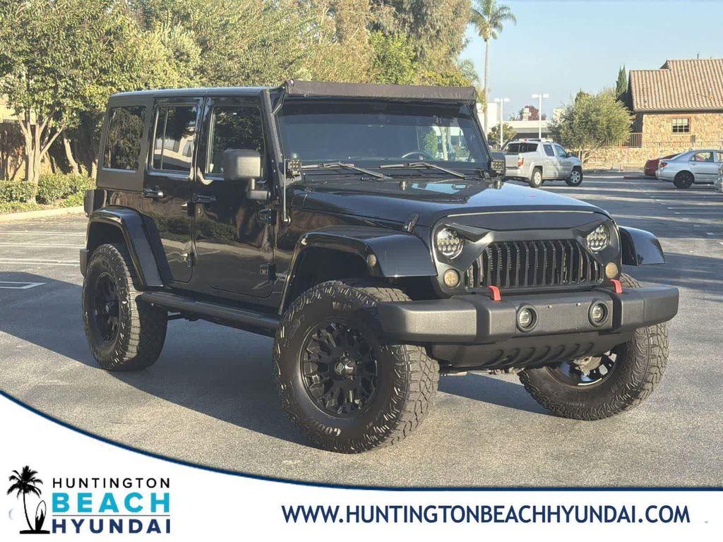 used 2014 Jeep Wrangler Unlimited car, priced at $18,928