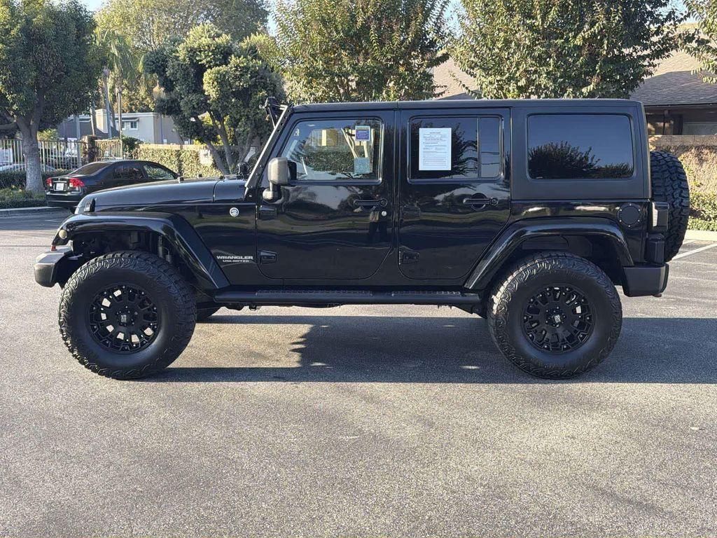 used 2014 Jeep Wrangler Unlimited car, priced at $18,928