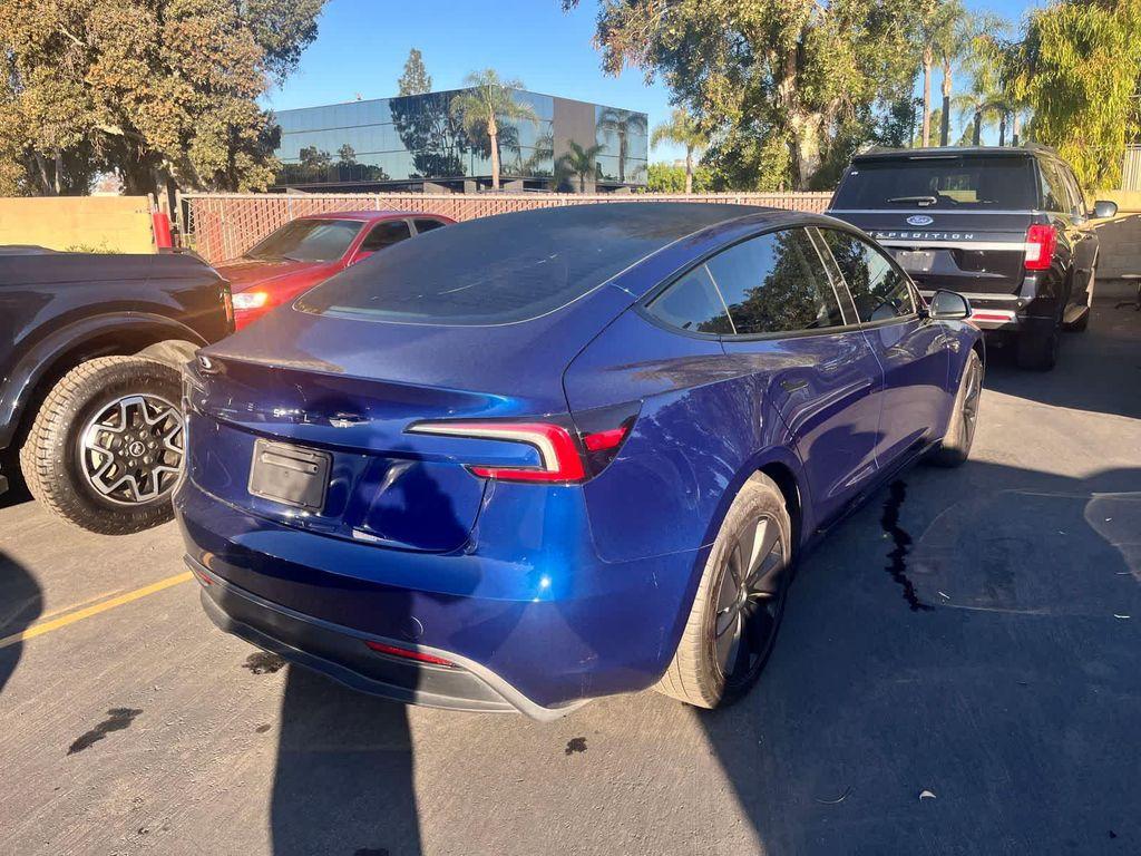 used 2024 Tesla Model 3 car, priced at $33,994