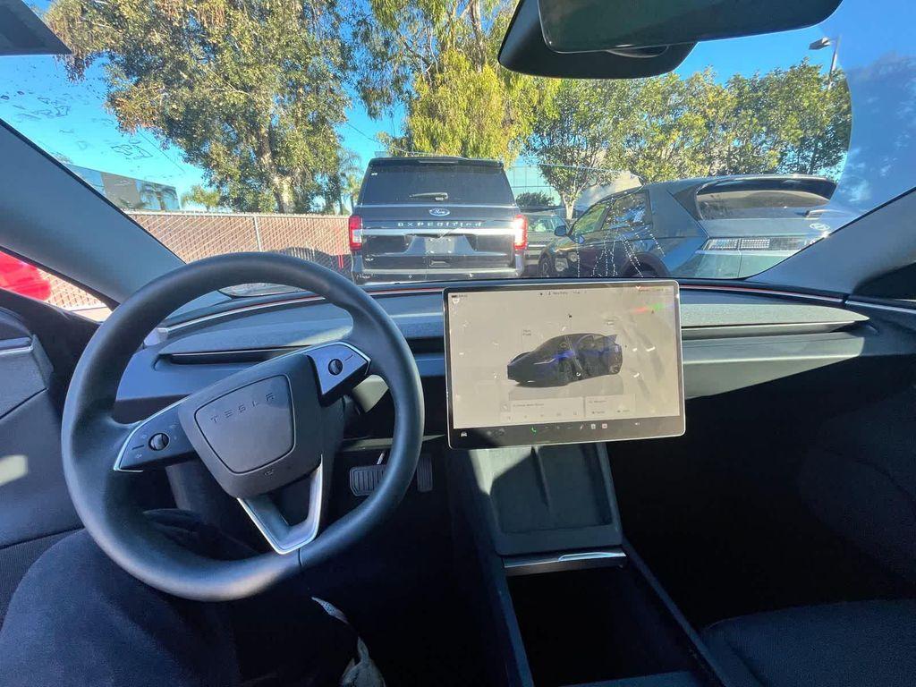 used 2024 Tesla Model 3 car, priced at $33,994