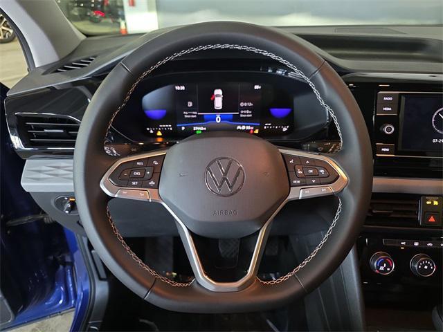 used 2023 Volkswagen Taos car, priced at $18,987
