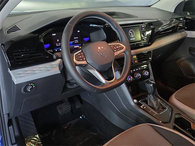 used 2023 Volkswagen Taos car, priced at $18,987