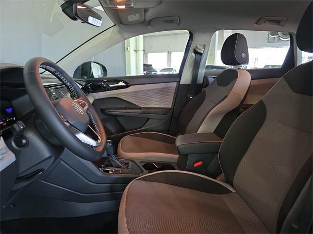 used 2023 Volkswagen Taos car, priced at $18,987