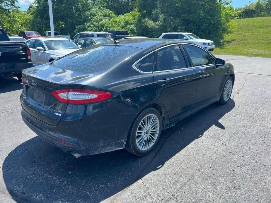 used 2014 Ford Fusion car, priced at $6,428