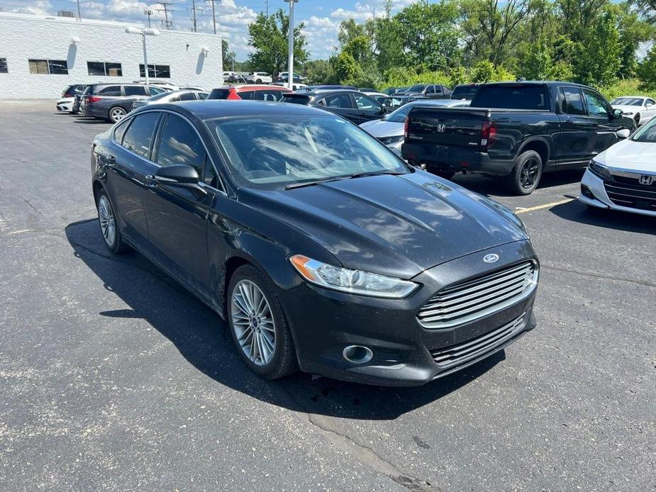 used 2014 Ford Fusion car, priced at $6,428