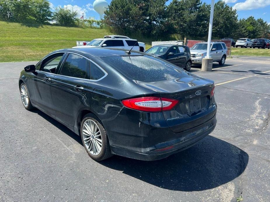 used 2014 Ford Fusion car, priced at $6,428