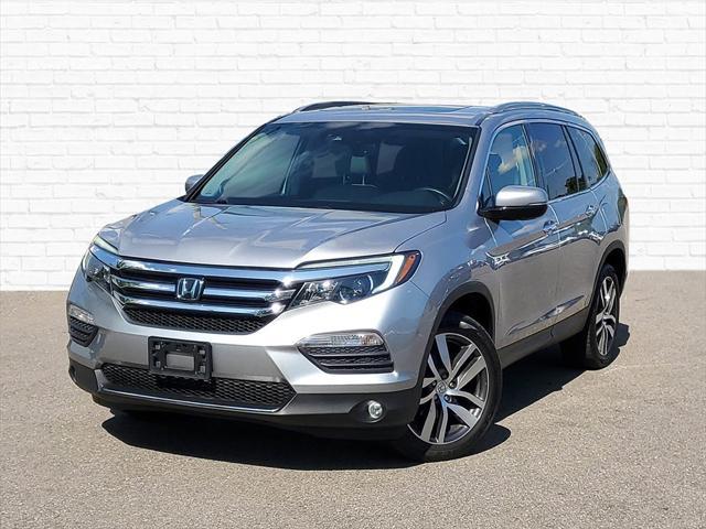 used 2018 Honda Pilot car, priced at $29,200