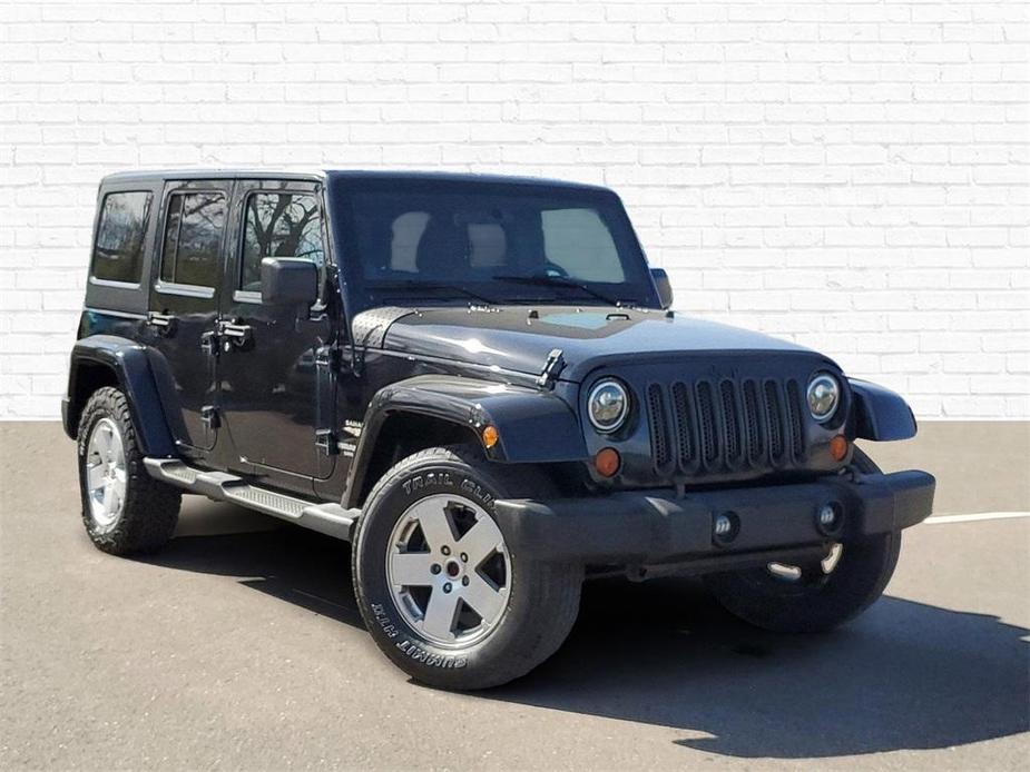 used 2012 Jeep Wrangler Unlimited car, priced at $14,598