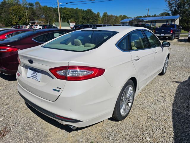 used 2014 Ford Fusion car, priced at $11,900