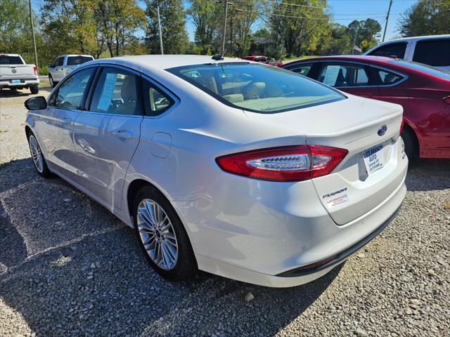 used 2014 Ford Fusion car, priced at $11,900