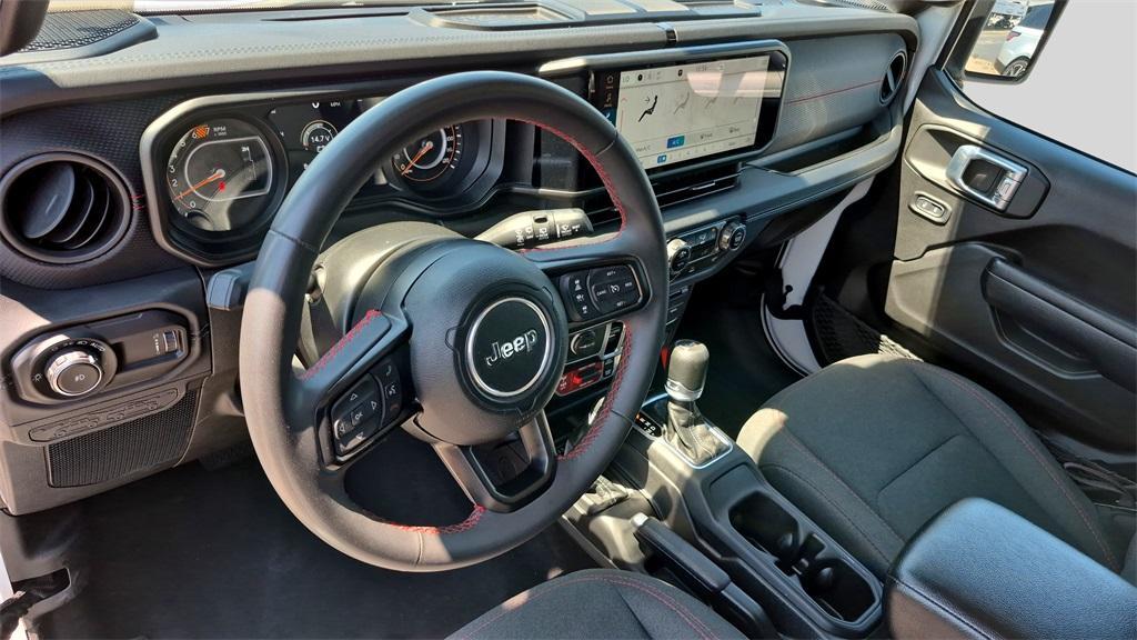 used 2024 Jeep Wrangler car, priced at $38,387