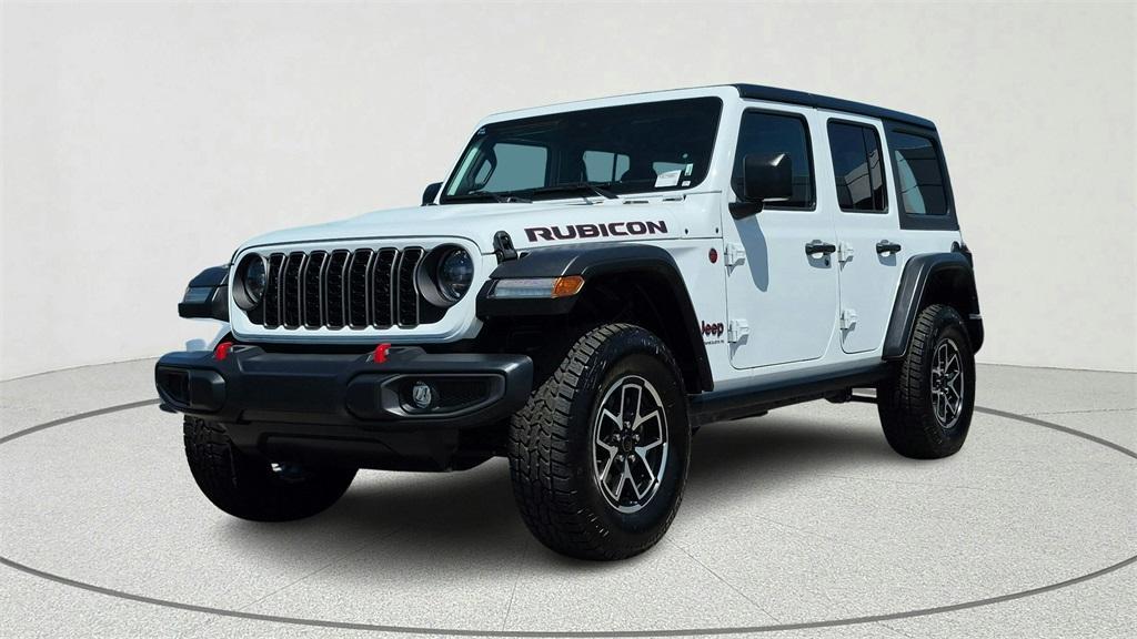 used 2024 Jeep Wrangler car, priced at $38,387