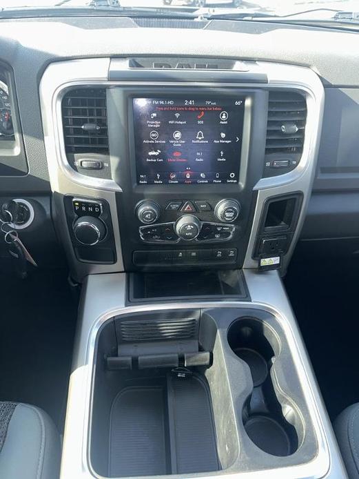 used 2018 Ram 1500 car, priced at $27,000