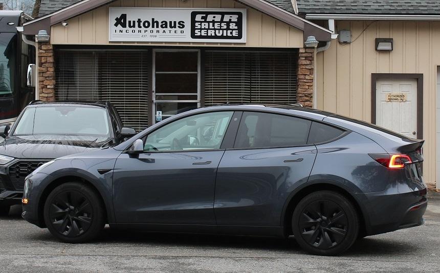 used 2023 Tesla Model Y car, priced at $30,900