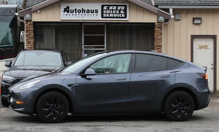 used 2023 Tesla Model Y car, priced at $30,900