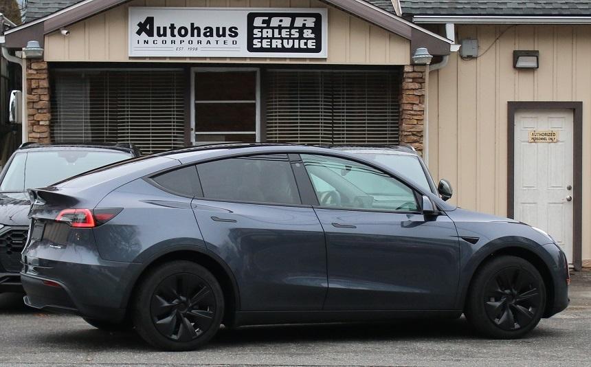 used 2023 Tesla Model Y car, priced at $30,900