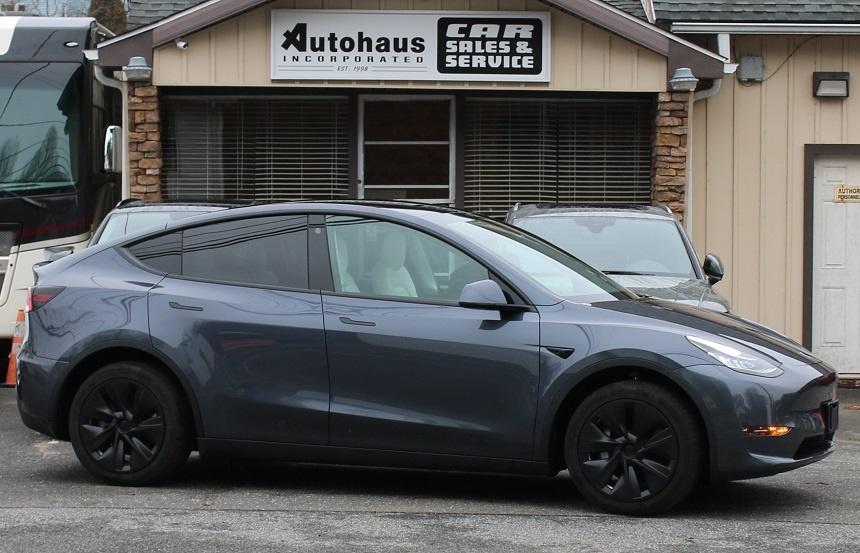 used 2023 Tesla Model Y car, priced at $30,900