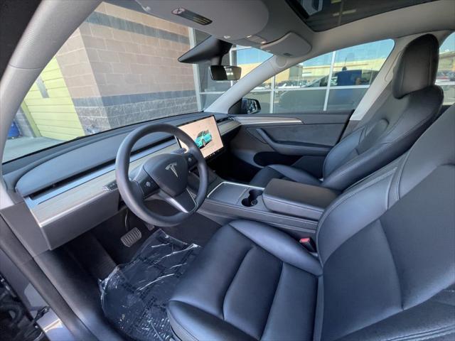 used 2023 Tesla Model Y car, priced at $30,777