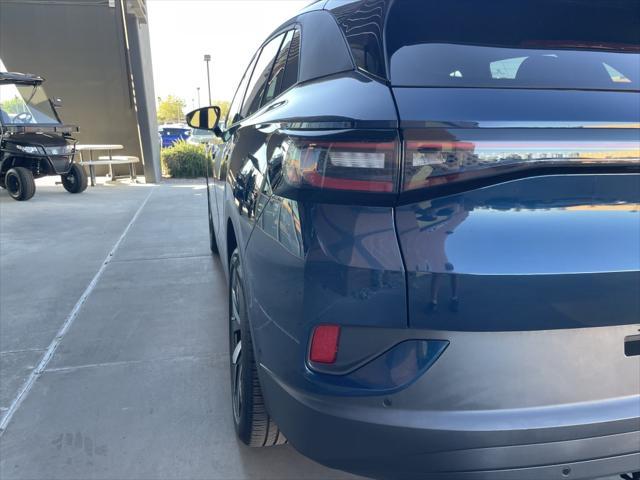used 2023 Volkswagen ID.4 car, priced at $27,477