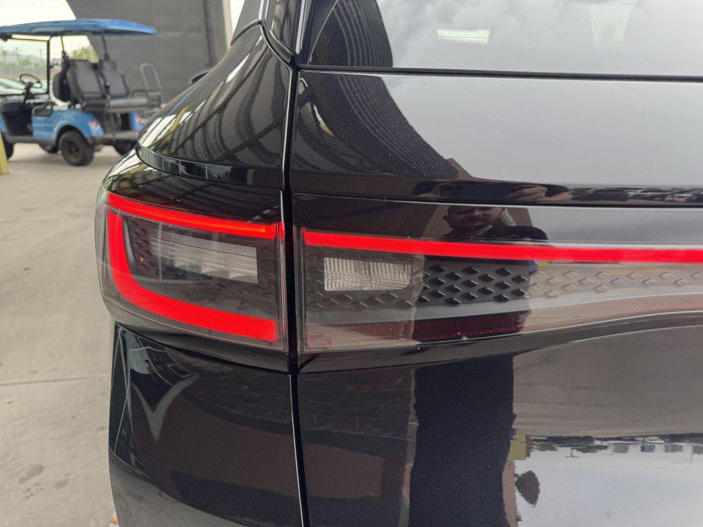 used 2023 Volkswagen ID.4 car, priced at $28,277