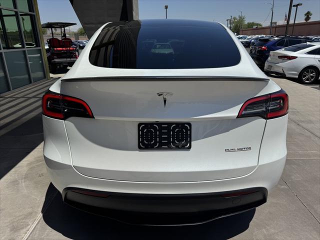 used 2023 Tesla Model Y car, priced at $34,977