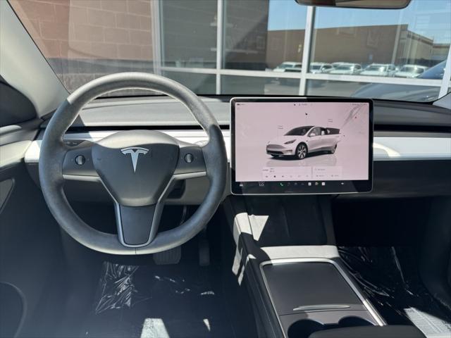 used 2024 Tesla Model Y car, priced at $34,977
