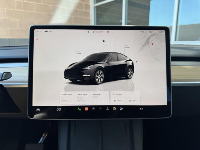 used 2024 Tesla Model Y car, priced at $33,977
