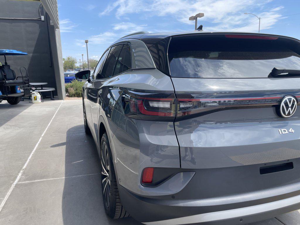 used 2023 Volkswagen ID.4 car, priced at $28,477