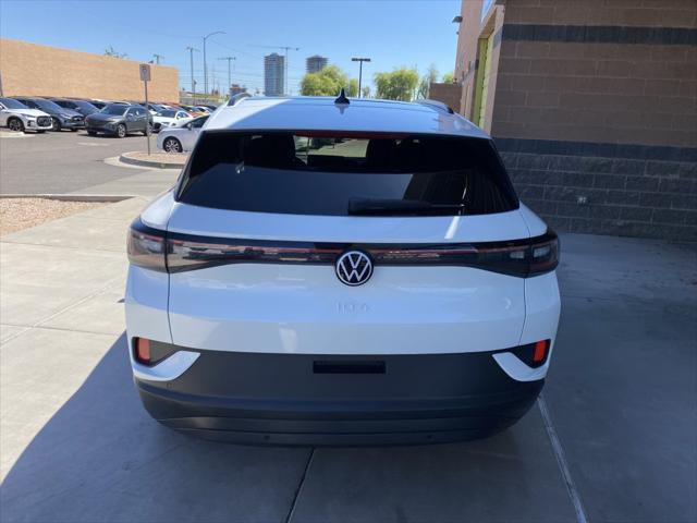 used 2023 Volkswagen ID.4 car, priced at $26,697