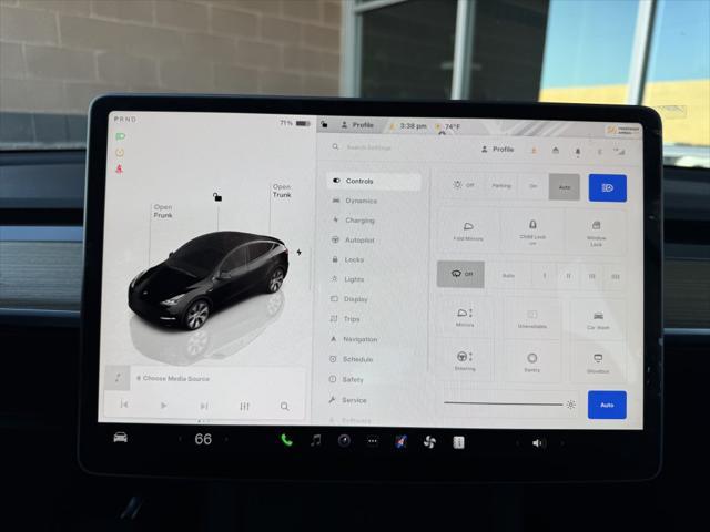 used 2023 Tesla Model Y car, priced at $34,977