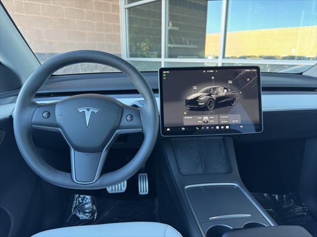 used 2023 Tesla Model Y car, priced at $36,277