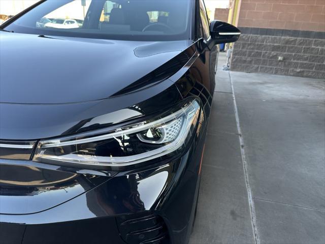 used 2023 Volkswagen ID.4 car, priced at $25,477
