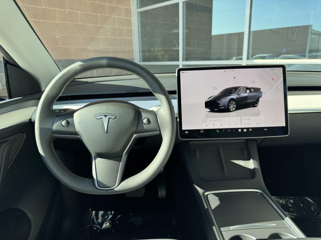 used 2024 Tesla Model Y car, priced at $35,497