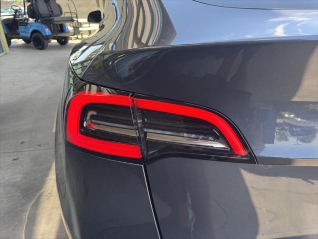 used 2023 Tesla Model Y car, priced at $30,977