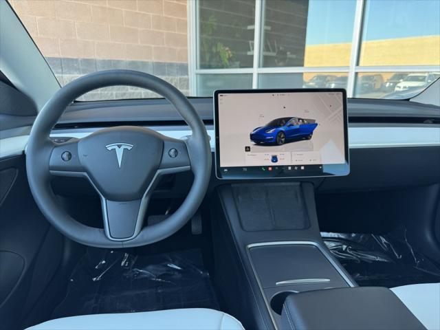 used 2023 Tesla Model 3 car, priced at $29,277