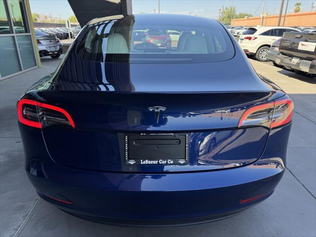 used 2023 Tesla Model 3 car, priced at $29,277