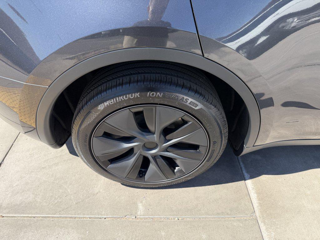 used 2024 Tesla Model Y car, priced at $34,277