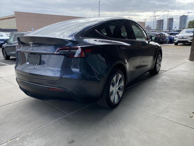 used 2024 Tesla Model Y car, priced at $39,477