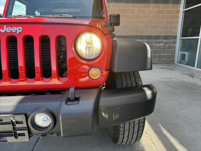 used 2015 Jeep Wrangler Unlimited car, priced at $21,977